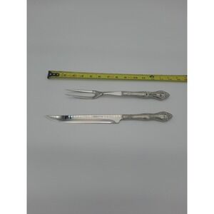 Princess House stainless steel U.S.A. carving knife and fork set, very ornate